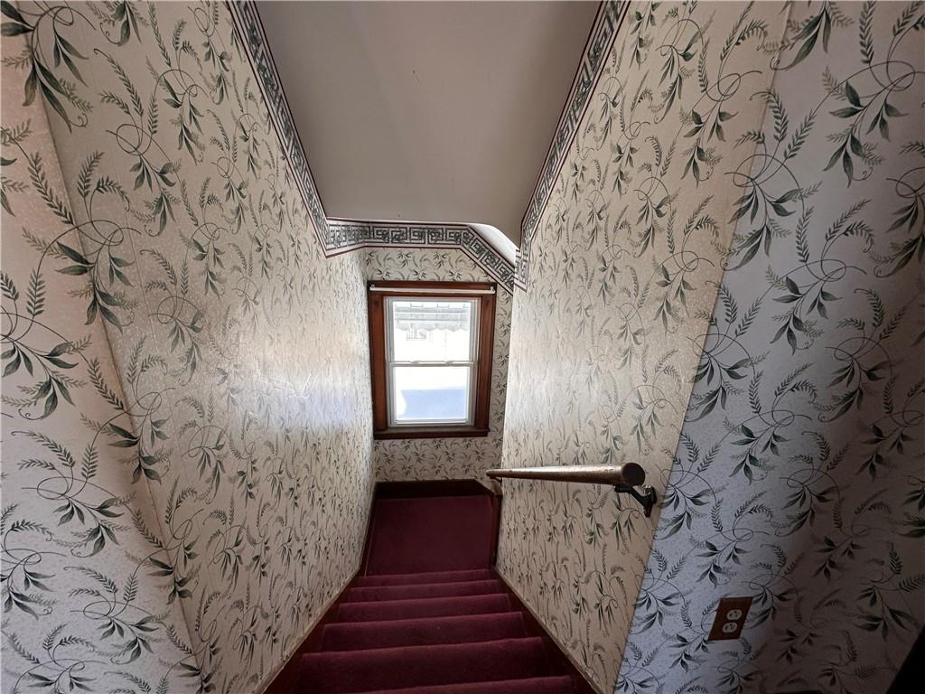 26 South Main Street Houston, PA 15342 - Photo 25 of 44 a view of a hallway with wooden floor and staircase