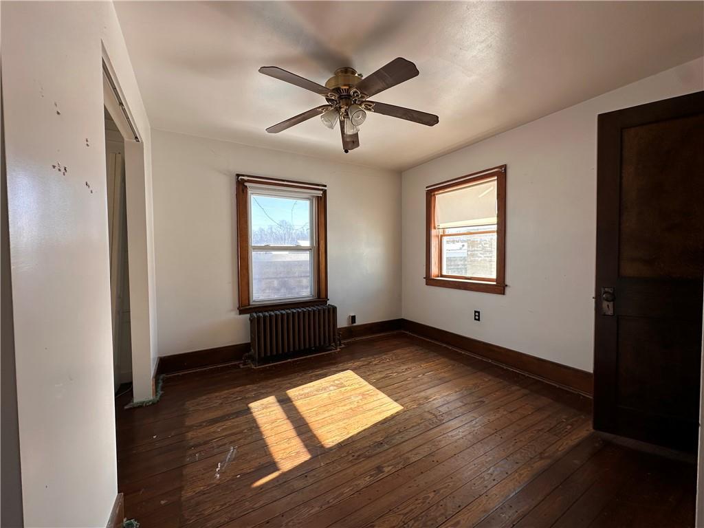 26 South Main Street Houston, PA 15342 - Photo 27 of 44 a view of empty room with wooden floor and fan
