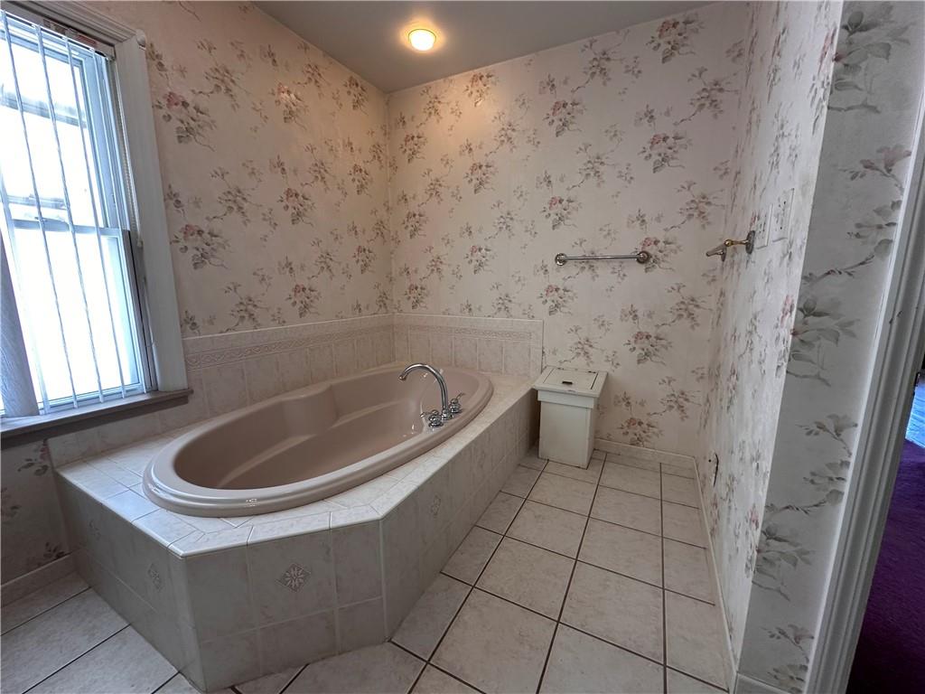 26 South Main Street Houston, PA 15342 - Photo 33 of 44 a bathroom with a bathtub and window