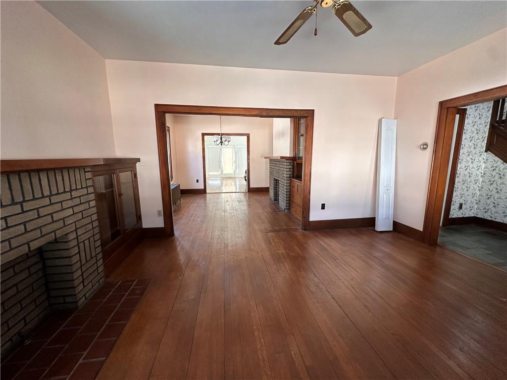 26 South Main Street Houston, PA 15342 - Photo 9 of 44 wooden floor in an empty room with a window