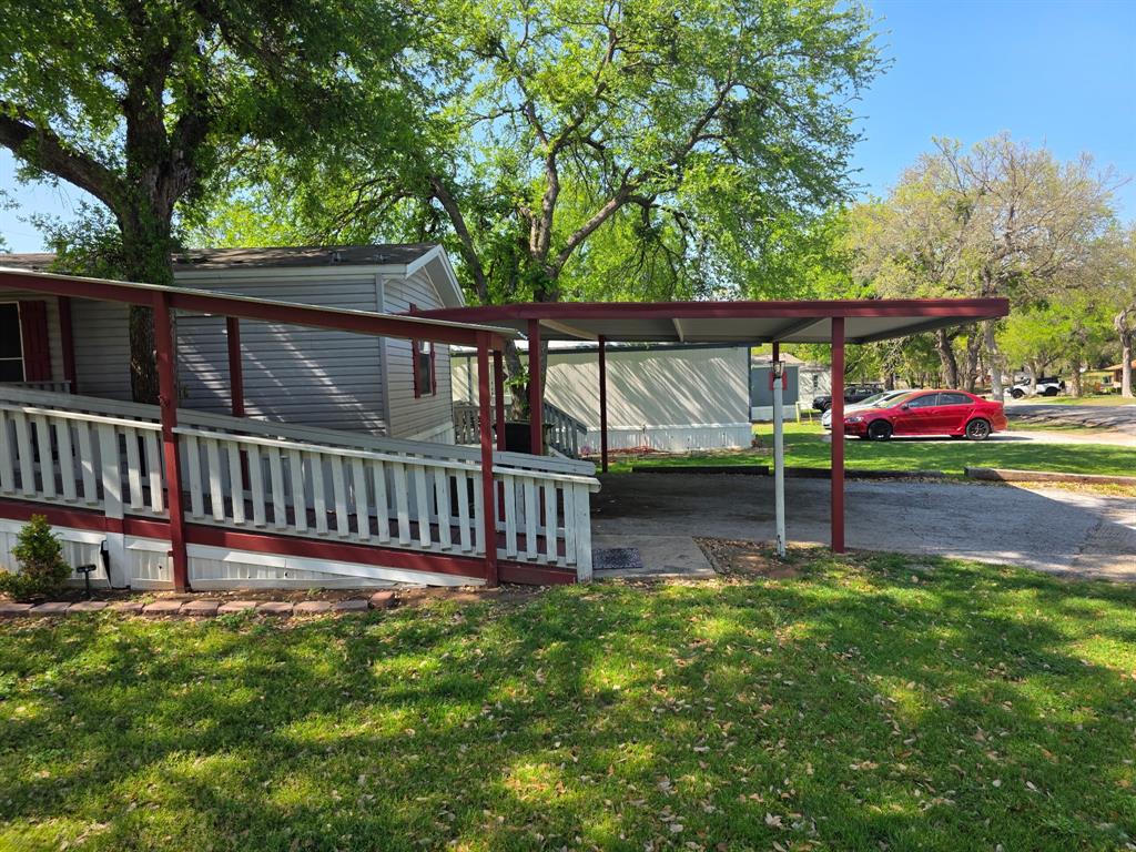 115 Yates Circle Aledo, TX 76008 - Photo 3 of 31 a view of a deck with a back yard