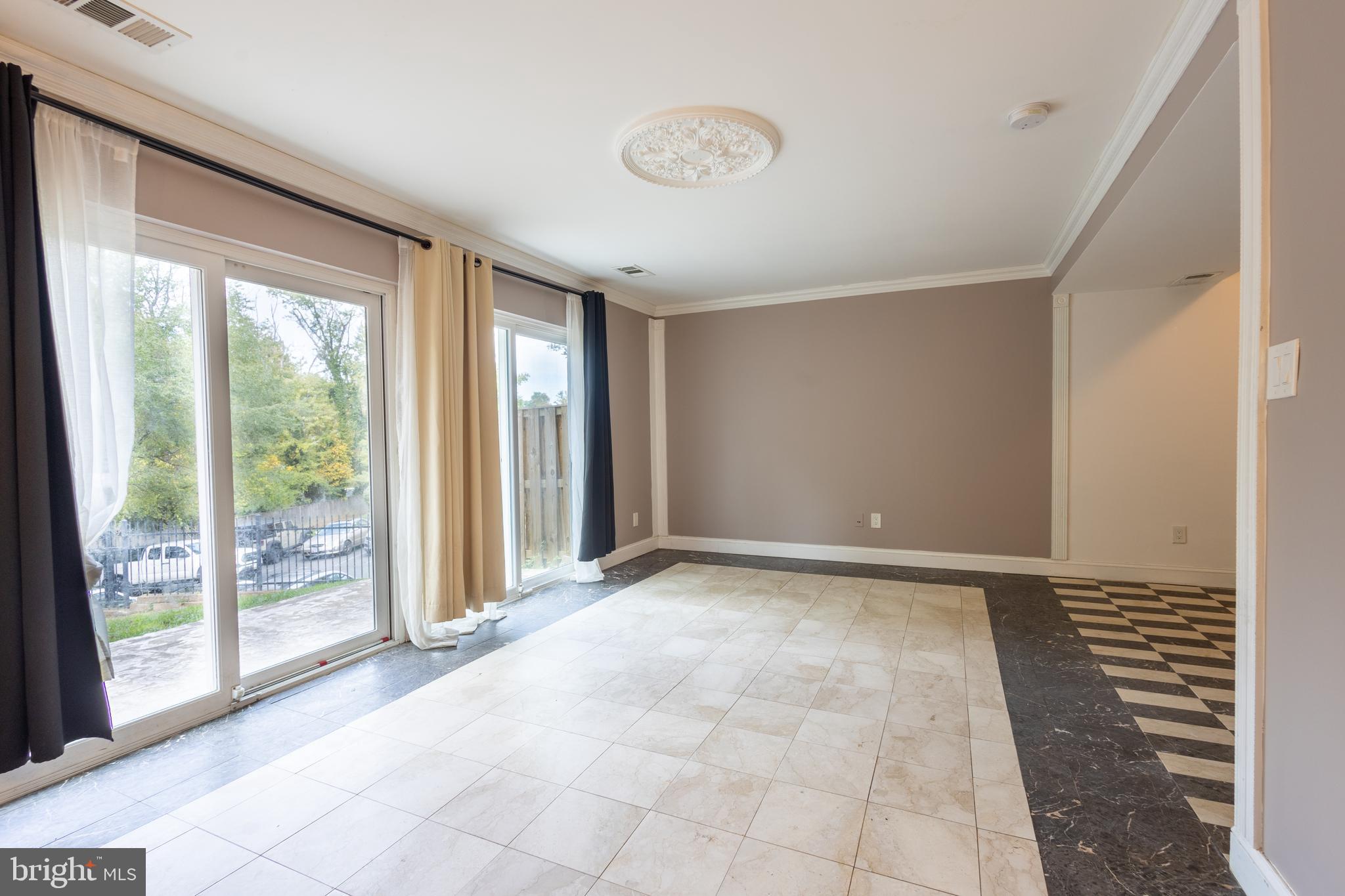 3332 Claridge Court Silver Spring, MD 20902 - Photo 3 of 30 a view of an empty room with a window