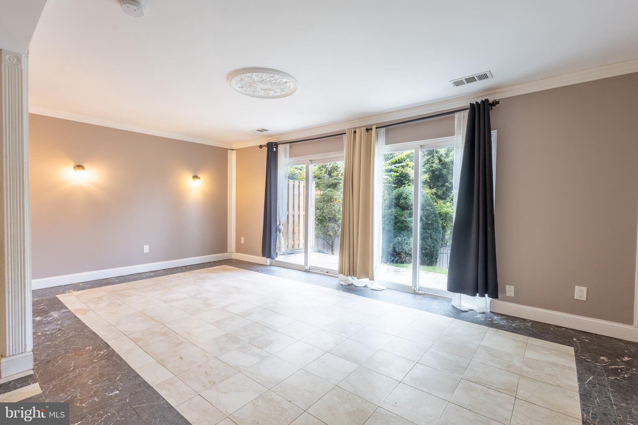 3332 Claridge Court Silver Spring, MD 20902 - Photo 4 of 30 a view of an empty room with a window