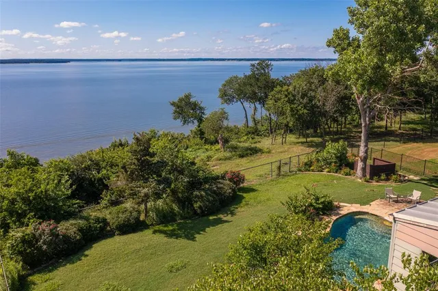 a view of a yard with an outdoor space and seating area