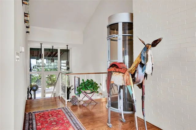 a front door view with a potted plant