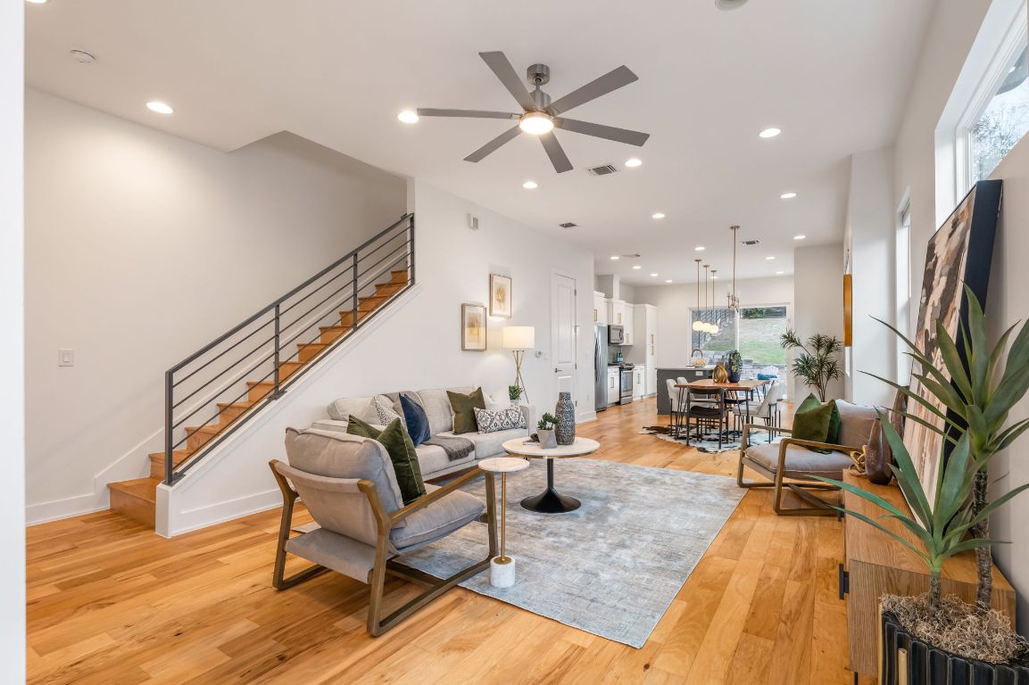 1301 Cometa Street, Unit A Austin, TX 78721 - Photo 38 of 38 Sunlit living space with hardwood floors, recessed lighting, and an open floor plan that flows seamlessly into the dining and kitchen areas
