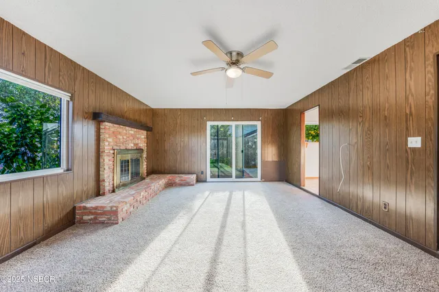 a view of a livingroom with a staircase