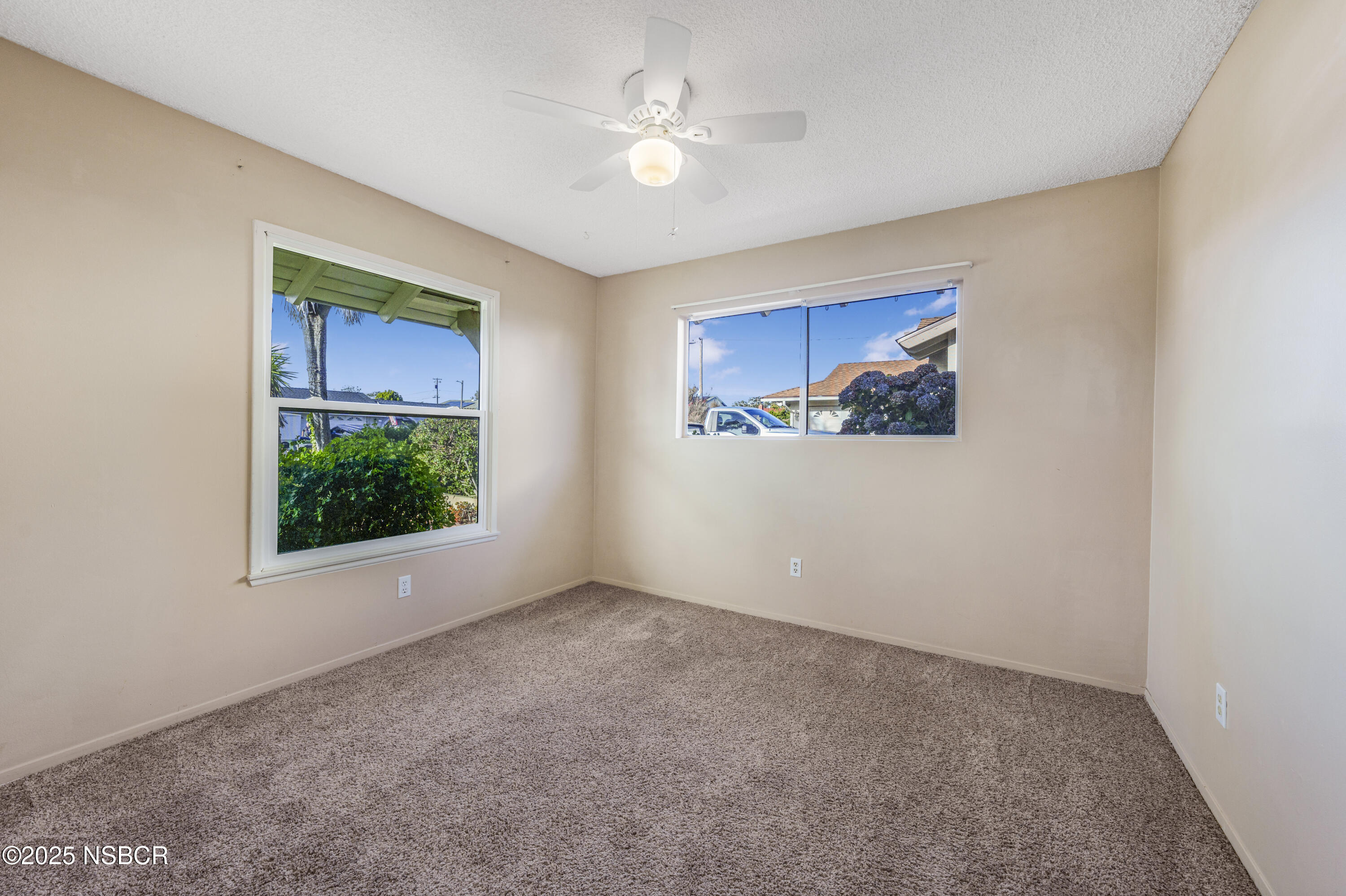 252 Pegasus Avenue Lompoc, CA 93436 - Photo 16 of 33 a view of an empty room with a window