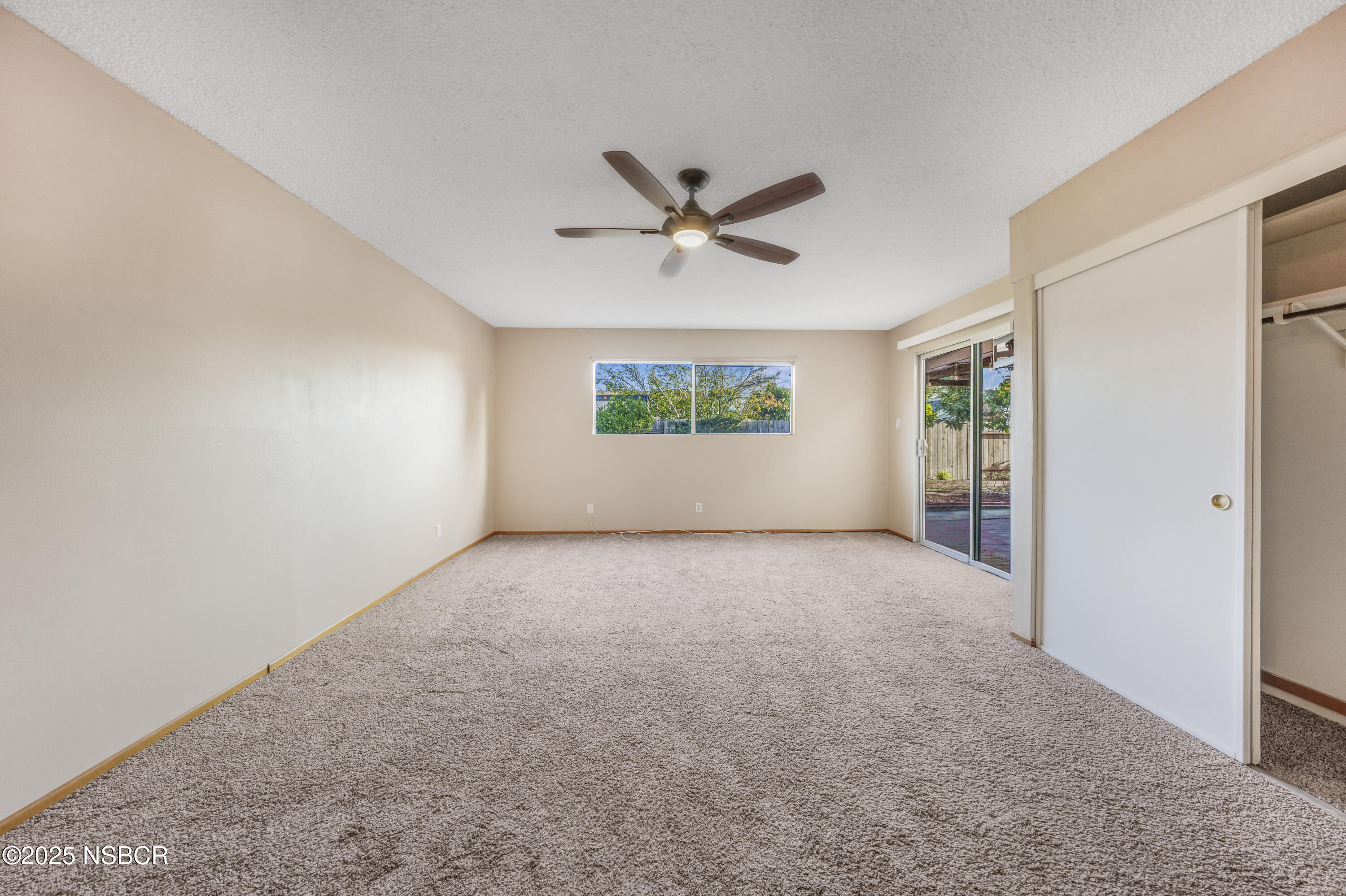 252 Pegasus Avenue Lompoc, CA 93436 - Photo 24 of 33 an empty room with a window and a fan