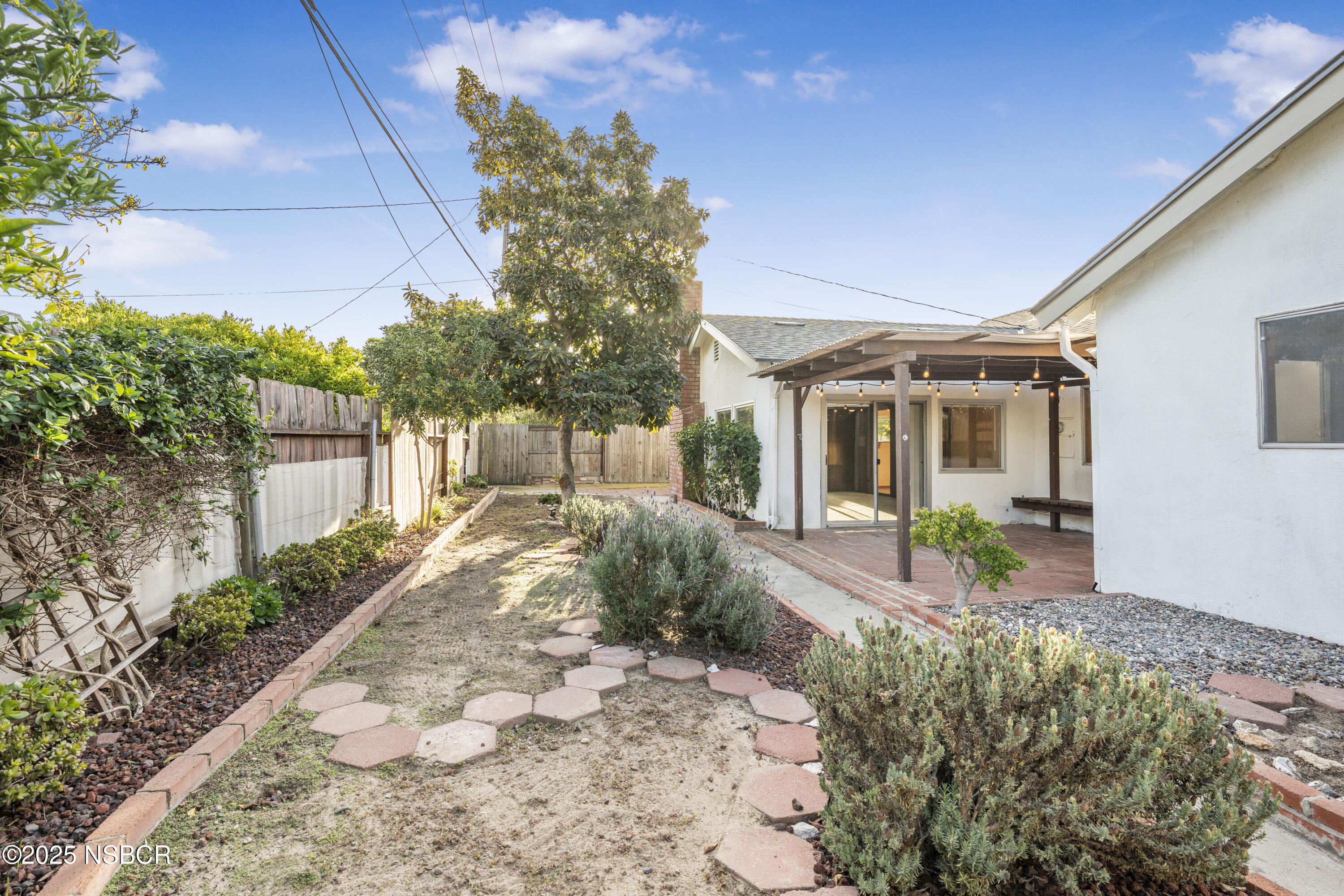 252 Pegasus Avenue Lompoc, CA 93436 - Photo 27 of 33 a front view of a house with garden
