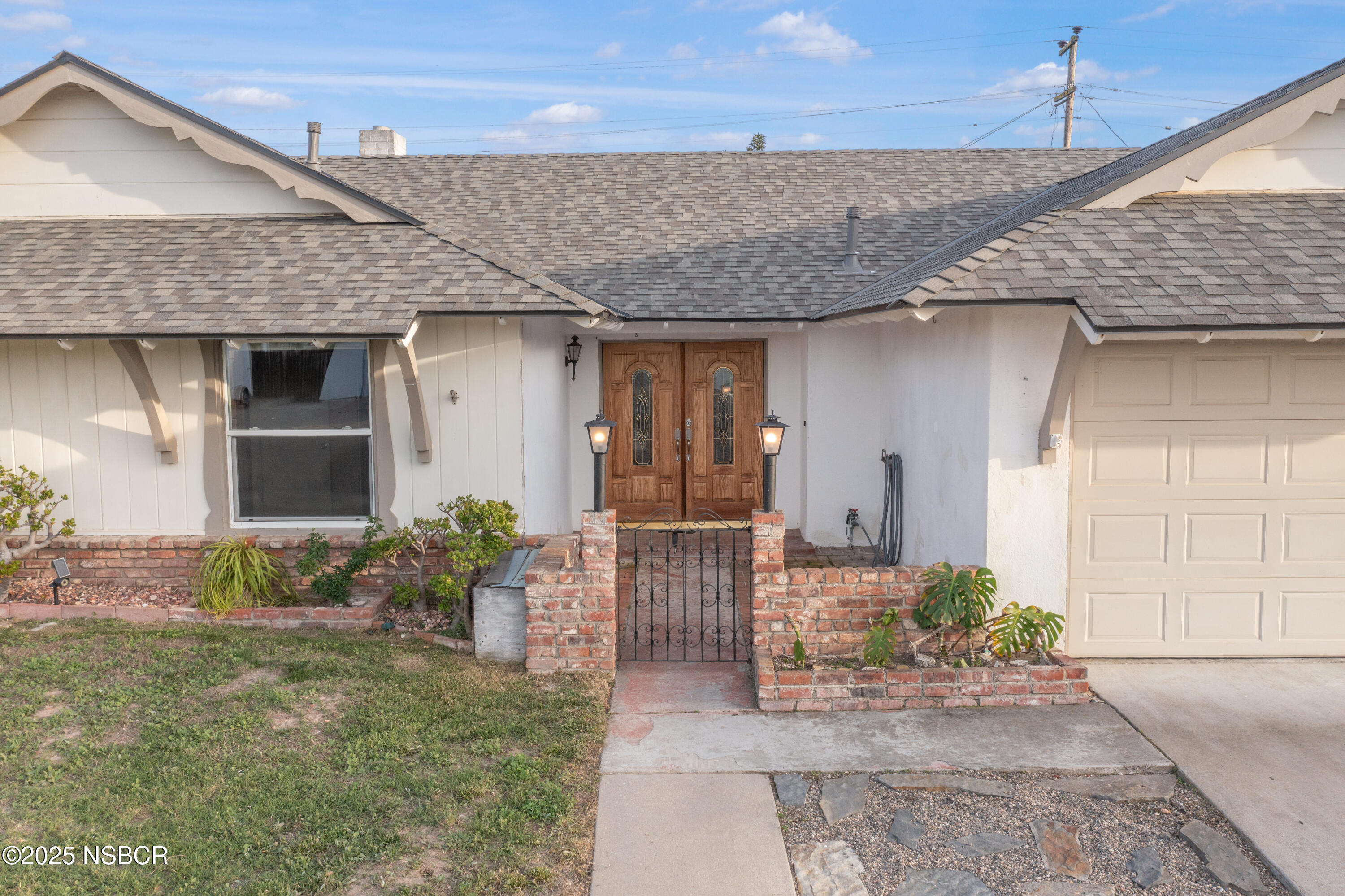 252 Pegasus Avenue Lompoc, CA 93436 - Photo 3 of 33 a front view of a house with garden