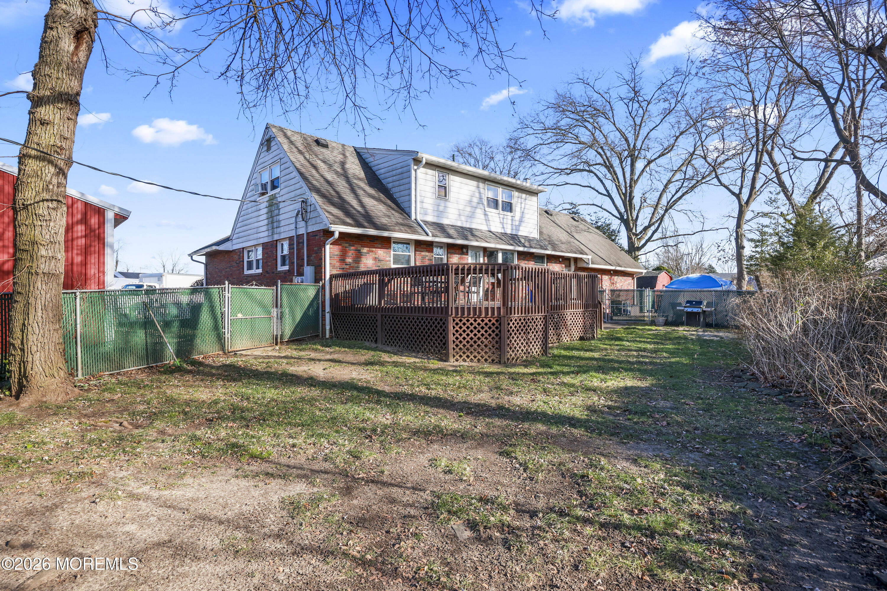 573 Lloyd Road Aberdeen, NJ 07747 - Photo 19 of 23 a view of a house with a yard