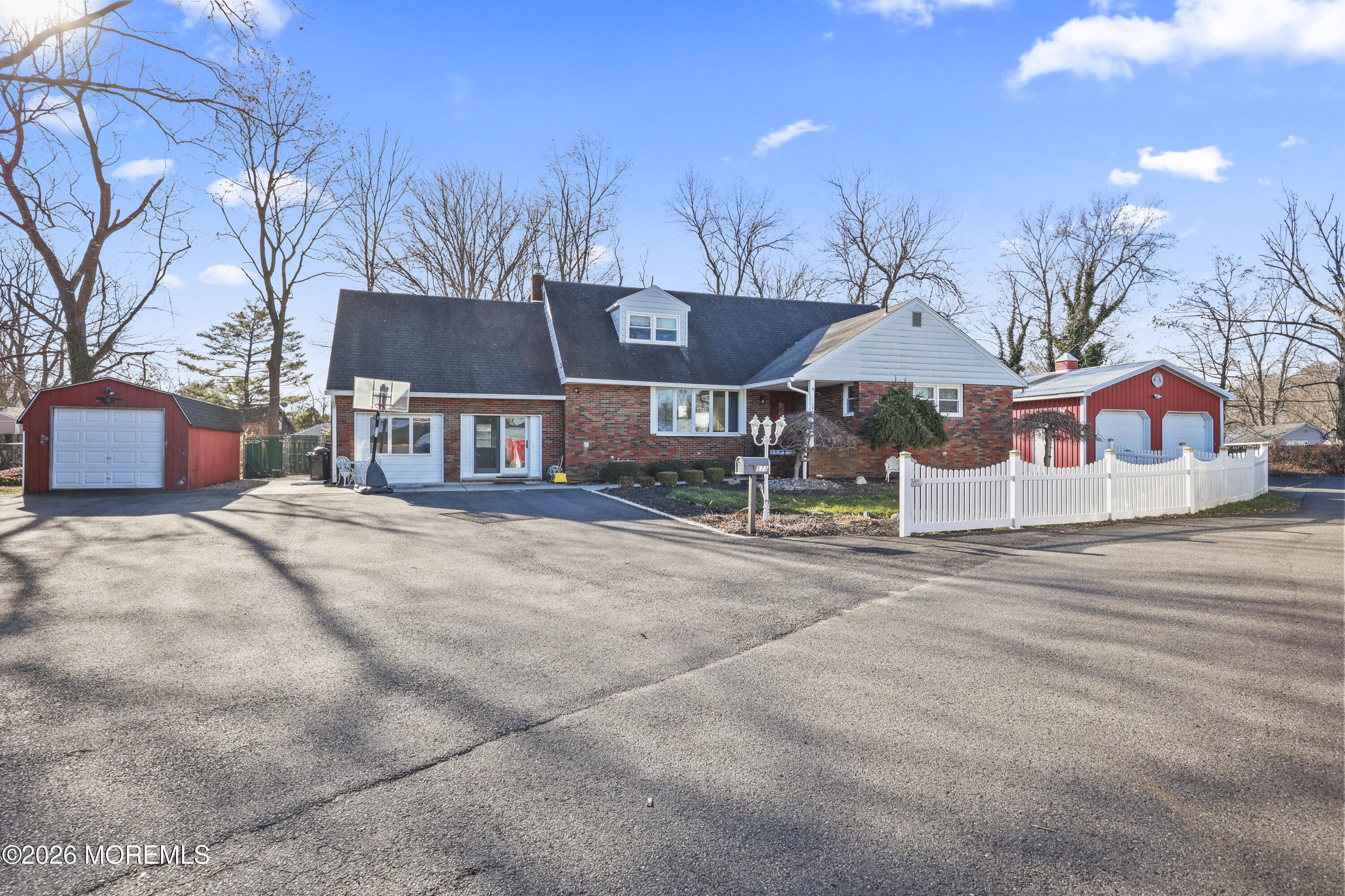 573 Lloyd Road Aberdeen, NJ 07747 - Photo 23 of 23 a front view of a building with street