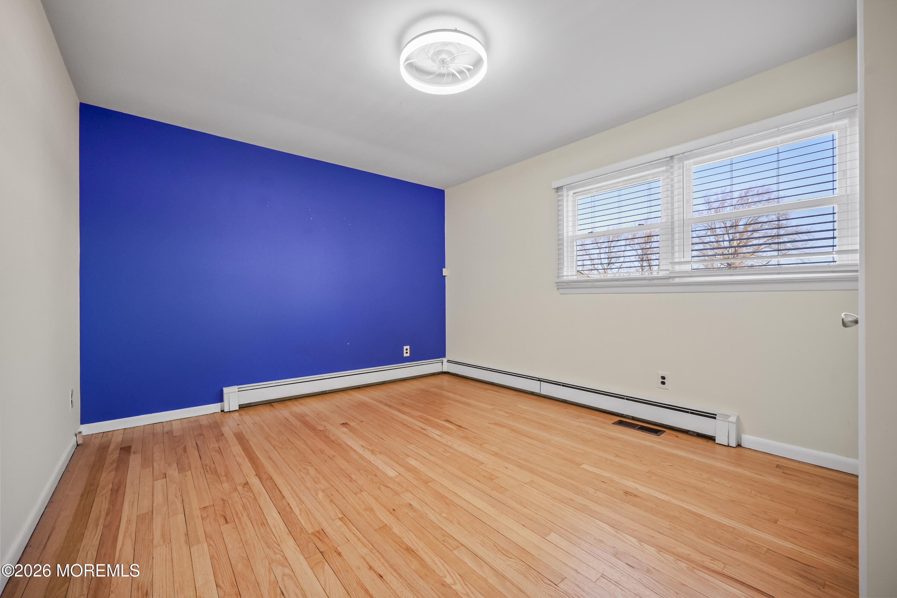 573 Lloyd Road Aberdeen, NJ 07747 - Photo 10 of 23 wooden floor in a room