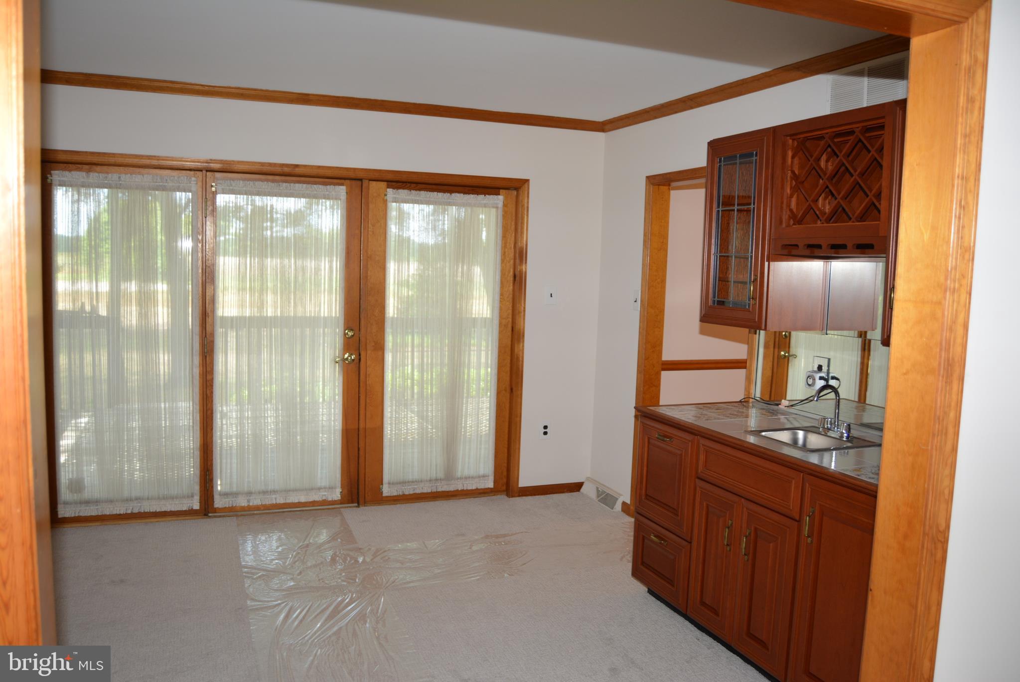 469 Red Lion Road Southampton, NJ 08088 - Photo 12 of 45 a view of hallway with bathroom and mirror