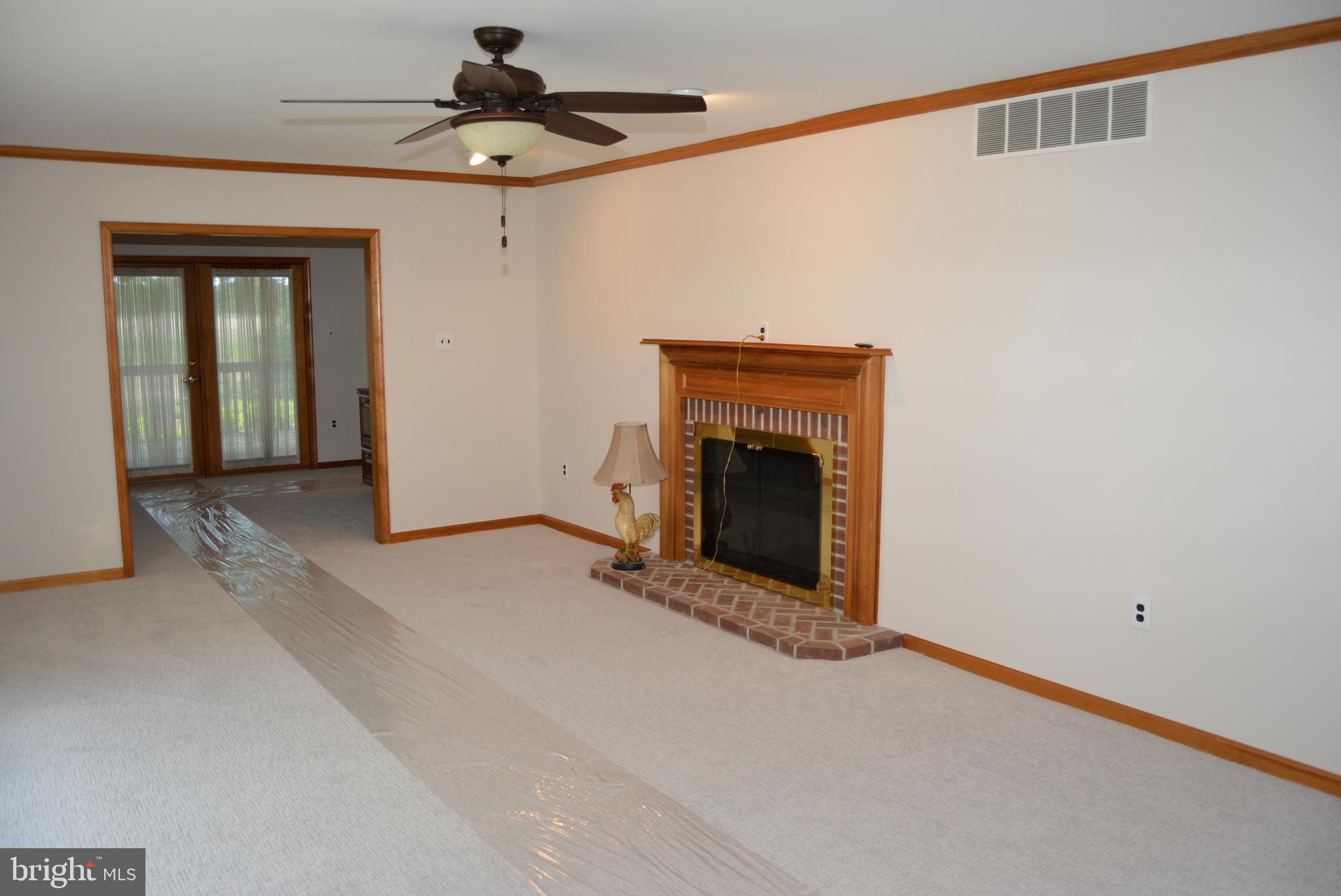 469 Red Lion Road Southampton, NJ 08088 - Photo 14 of 45 a view of empty room with fireplace