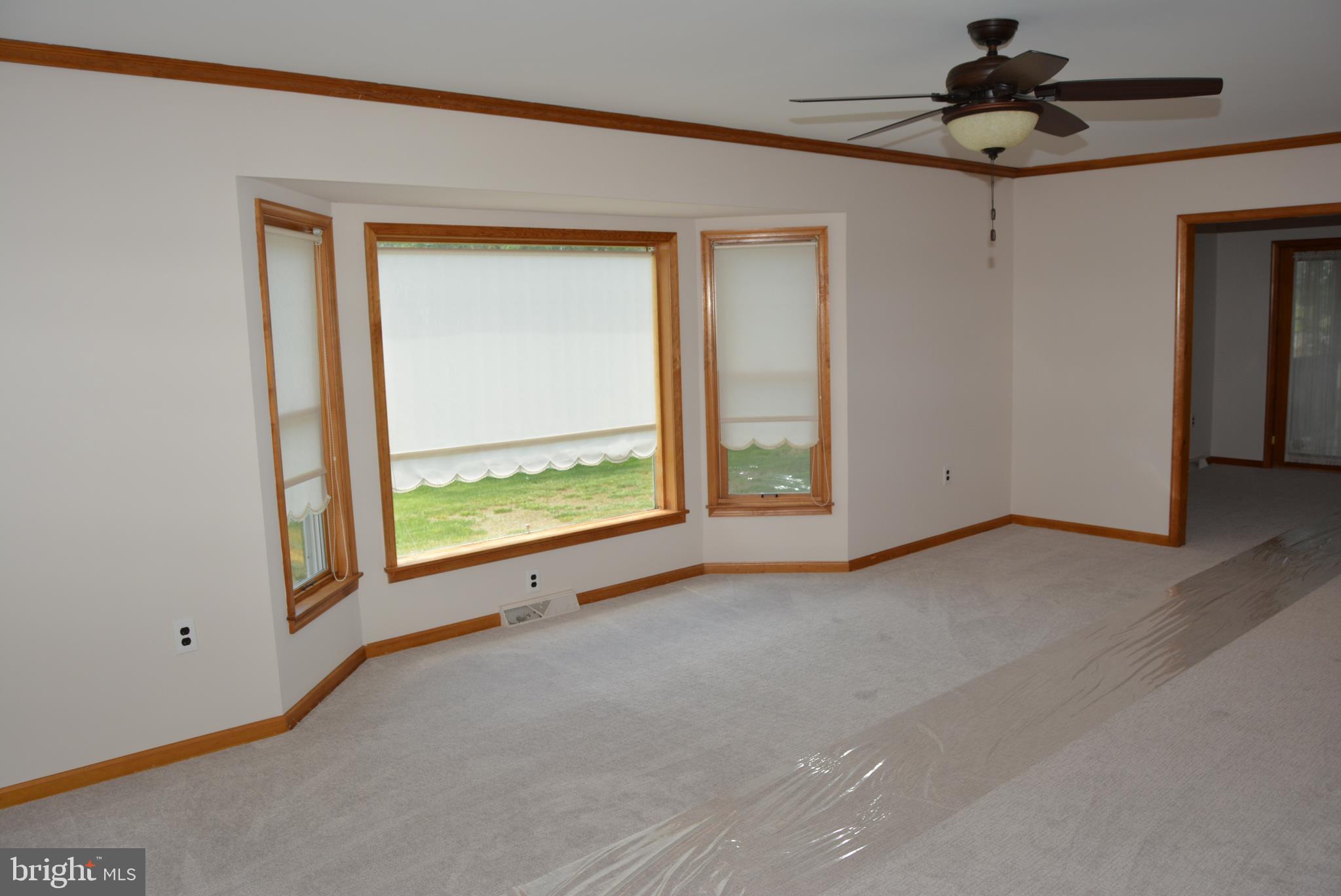 469 Red Lion Road Southampton, NJ 08088 - Photo 15 of 45 a view of an empty room with a window