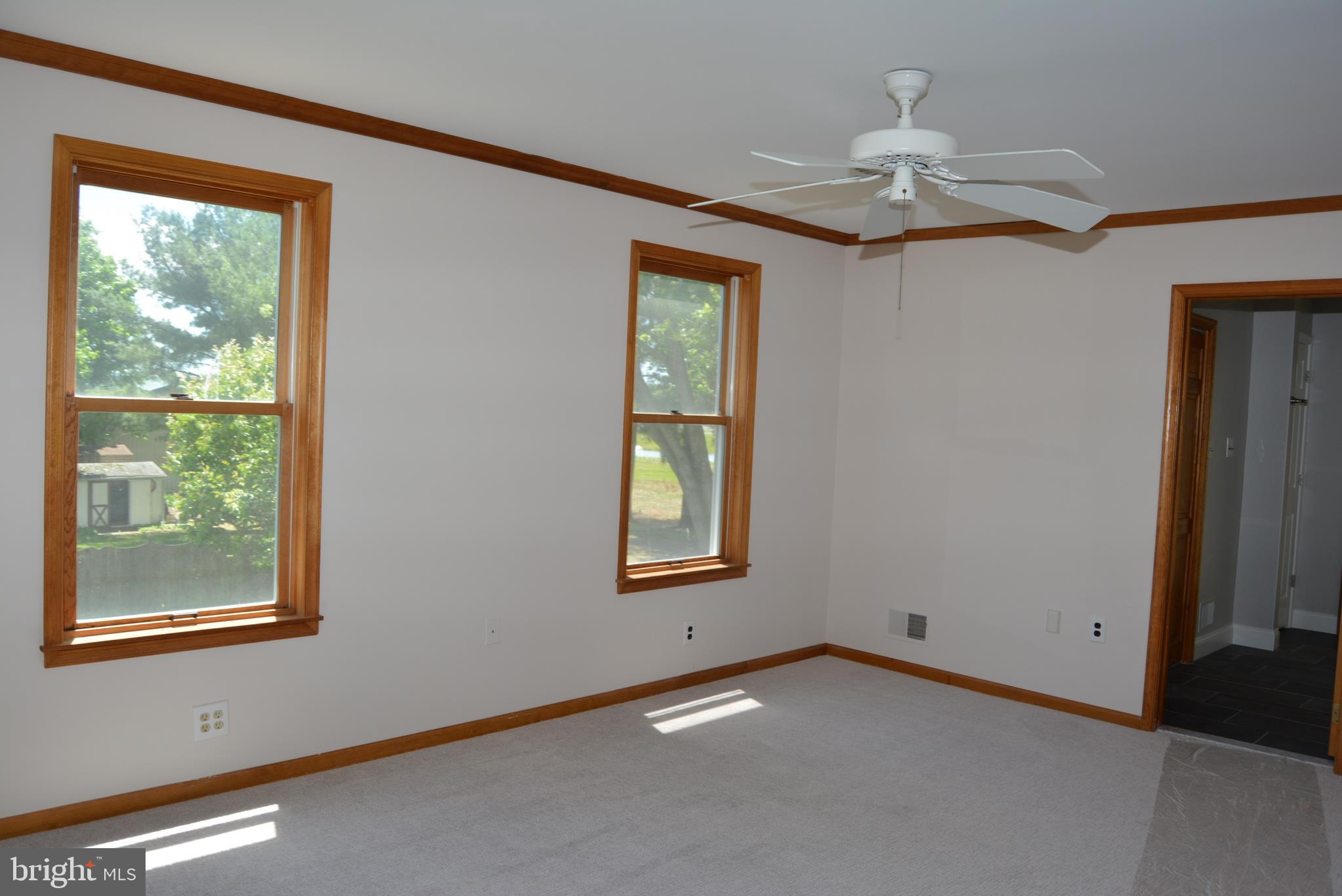 469 Red Lion Road Southampton, NJ 08088 - Photo 16 of 45 a view of an empty room with a window