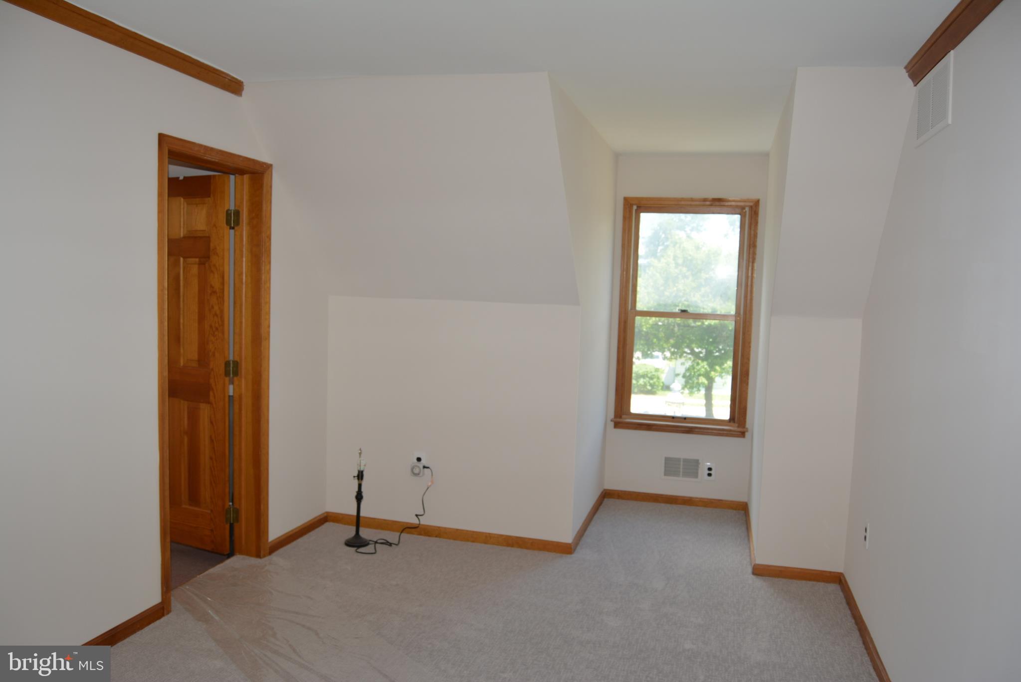 469 Red Lion Road Southampton, NJ 08088 - Photo 21 of 45 an empty room with windows