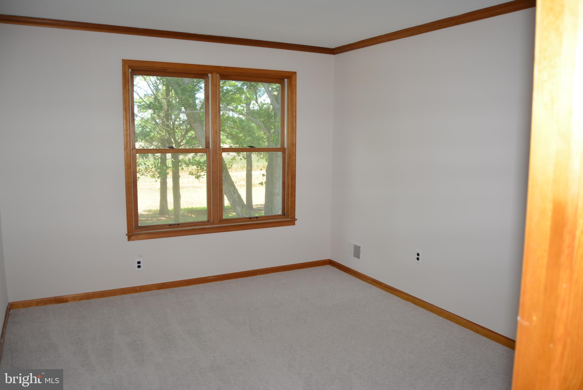 469 Red Lion Road Southampton, NJ 08088 - Photo 24 of 45 a view of an empty room with a window
