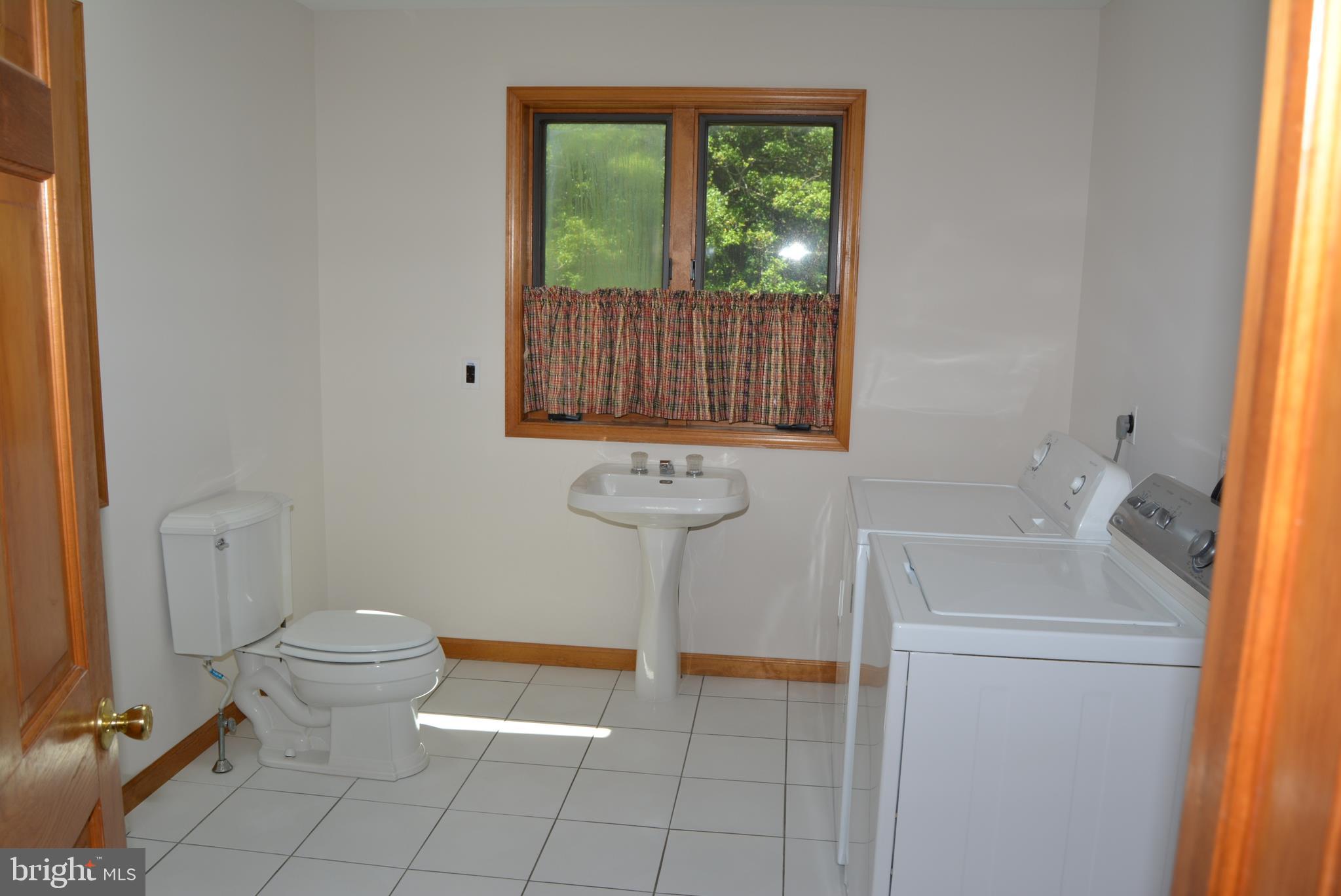 469 Red Lion Road Southampton, NJ 08088 - Photo 28 of 45 a bathroom with a sink a toilet and a shower