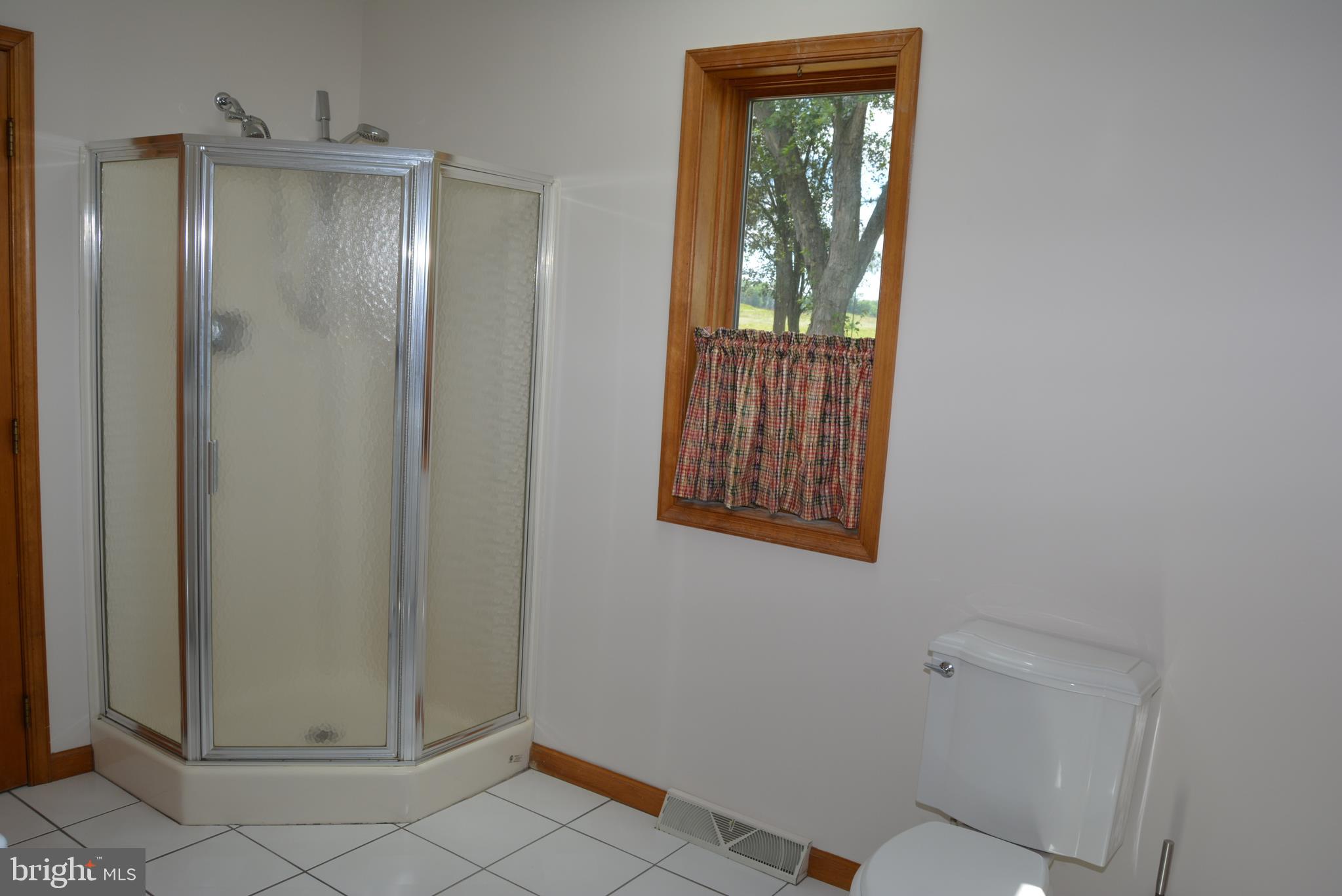 469 Red Lion Road Southampton, NJ 08088 - Photo 29 of 45 a bathroom with a glass shower door