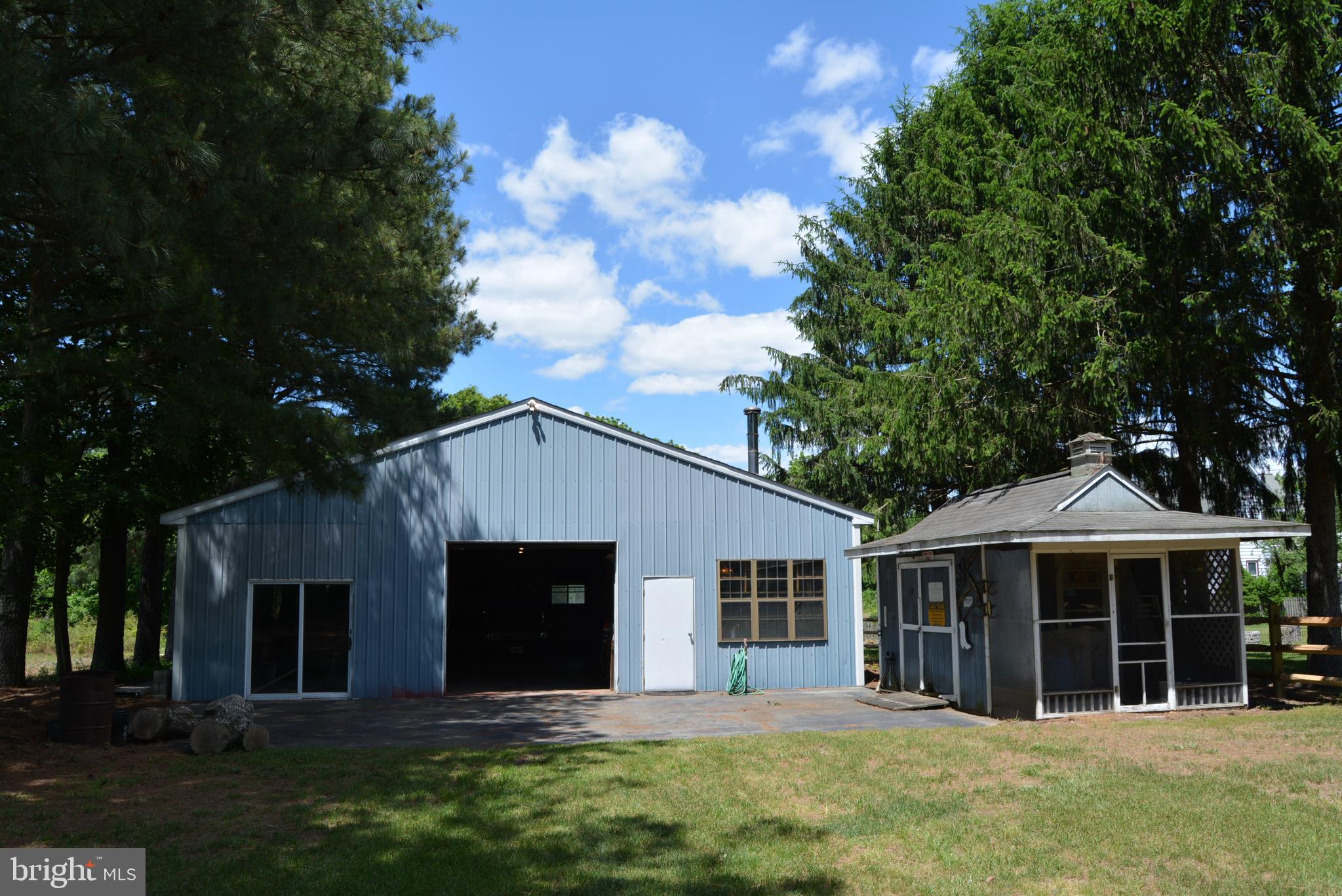 469 Red Lion Road Southampton, NJ 08088 - Photo 39 of 45 a front view of a house with a yard and trees