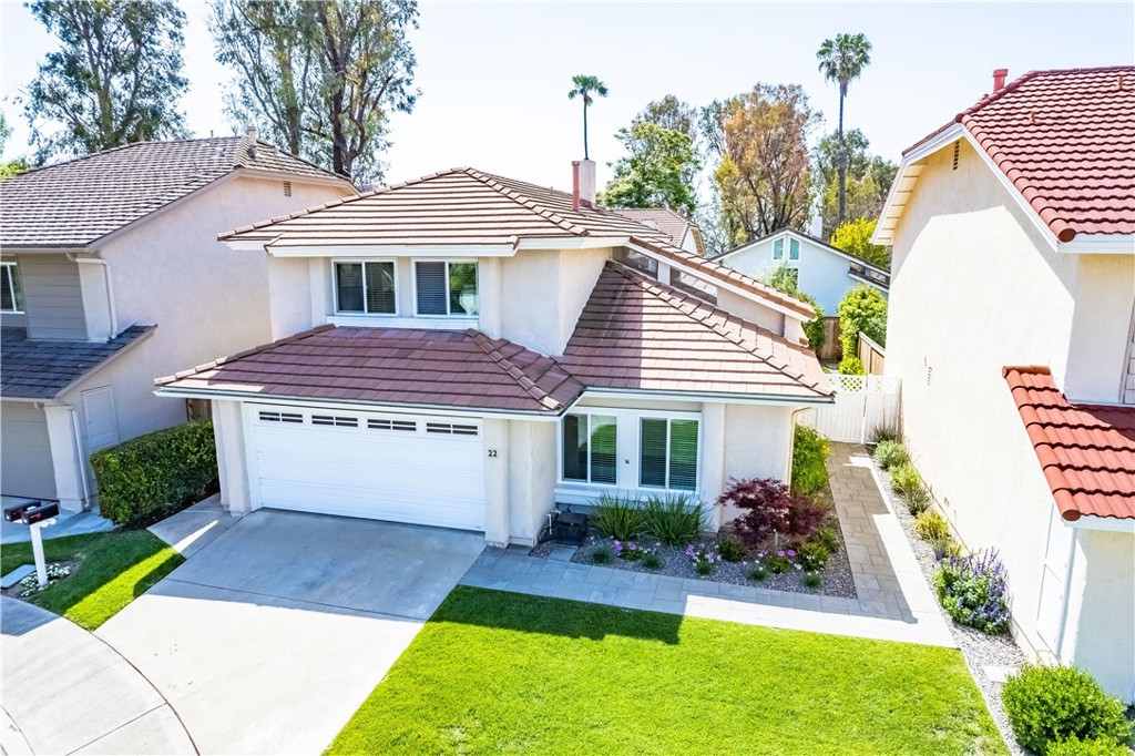 22 Delamesa West Irvine, CA 92620 - Photo 1 of 1 a front view of a house with a yard