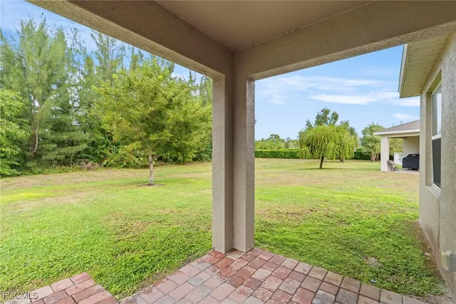 a view of a garden with an outdoor space