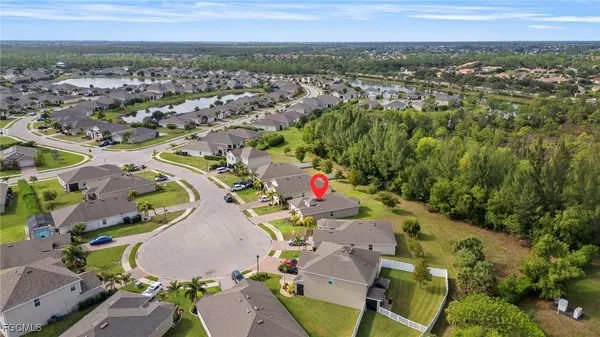an aerial view of a city with lots of residential buildings