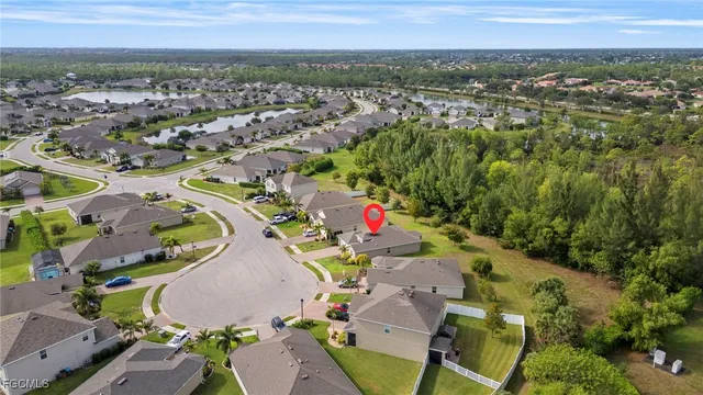 an aerial view of a city with lots of residential buildings