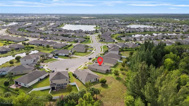 an aerial view of residential house with outdoor space