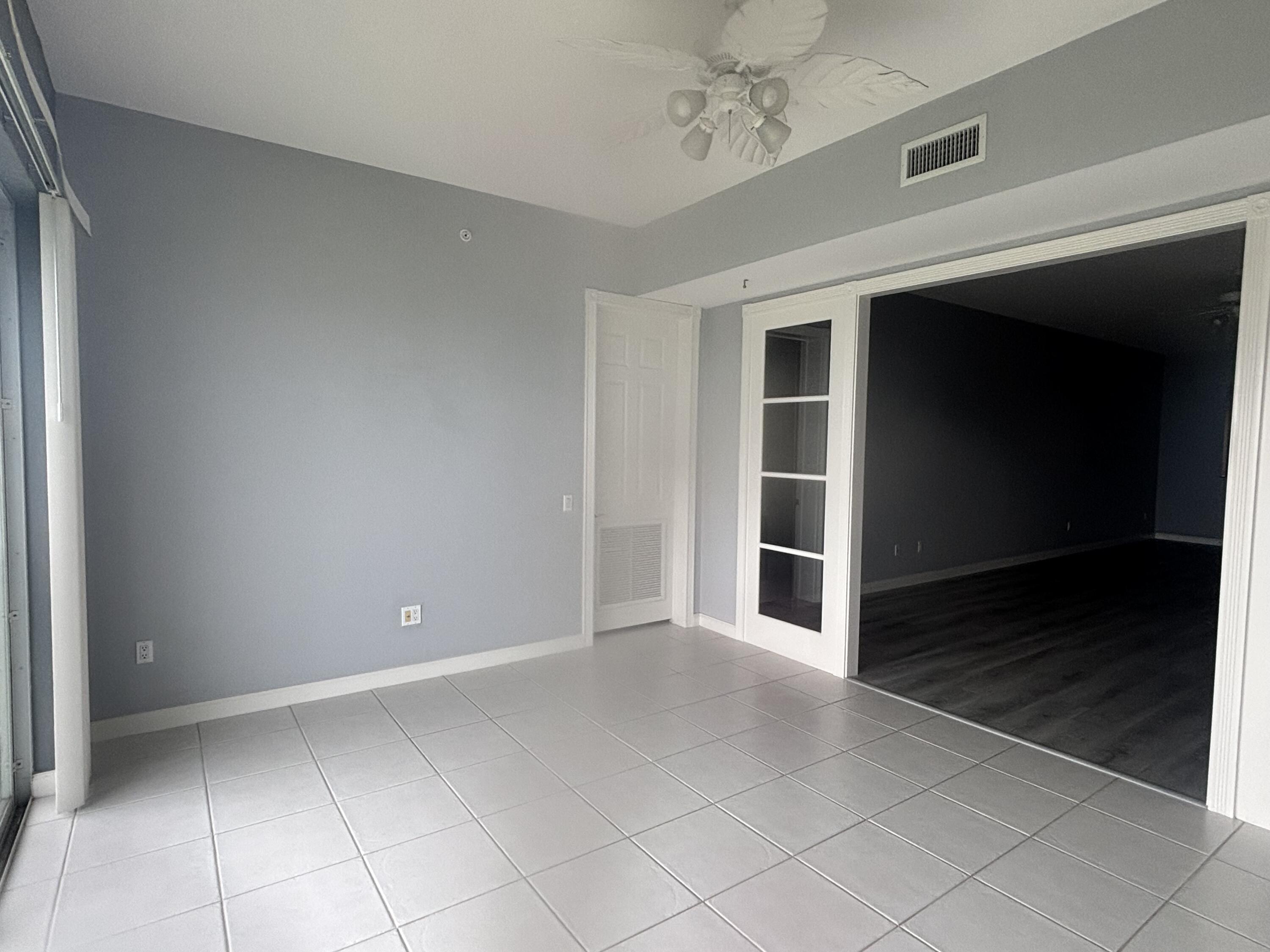 31 Harbour Isle Drive West, Unit 303 Fort Pierce, FL 34949 - Photo 13 of 31 a view of an empty room with a window