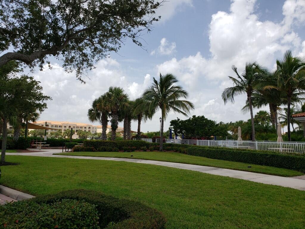31 Harbour Isle Drive West, Unit 303 Fort Pierce, FL 34949 - Photo 18 of 31 a view of a park and palm trees