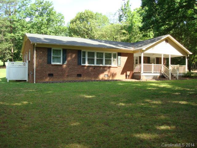 3205 Puetts Chapel Road Dallas, NC 28034 - Photo 1 of 24 a front view of house with yard and green space