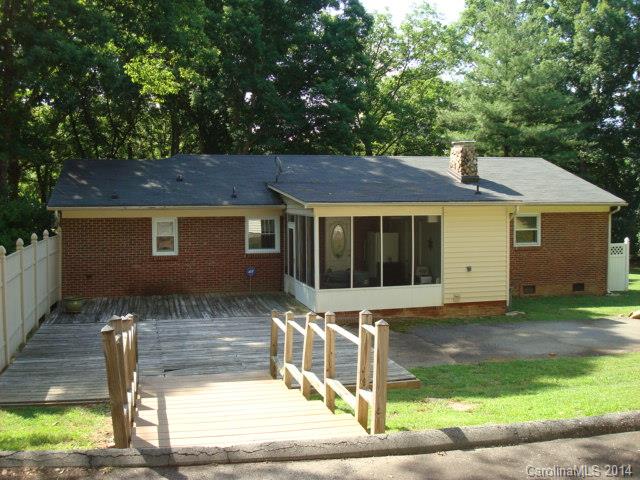 3205 Puetts Chapel Road Dallas, NC 28034 - Photo 2 of 24 a front view of a house with garden