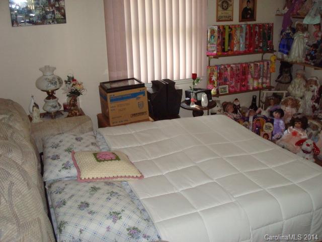 3205 Puetts Chapel Road Dallas, NC 28034 - Photo 14 of 24 a room with gym equipment and a window