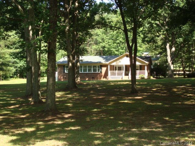 3205 Puetts Chapel Road Dallas, NC 28034 - Photo 20 of 24 a front view of a house with a yard