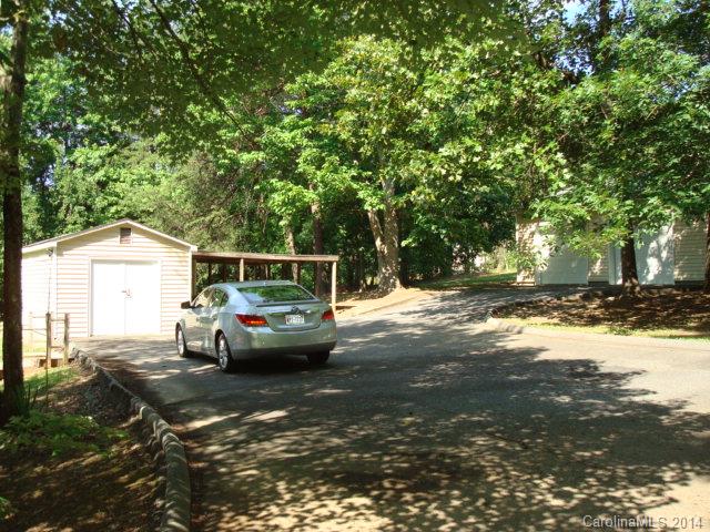 3205 Puetts Chapel Road Dallas, NC 28034 - Photo 22 of 24 a front view of a house with yard
