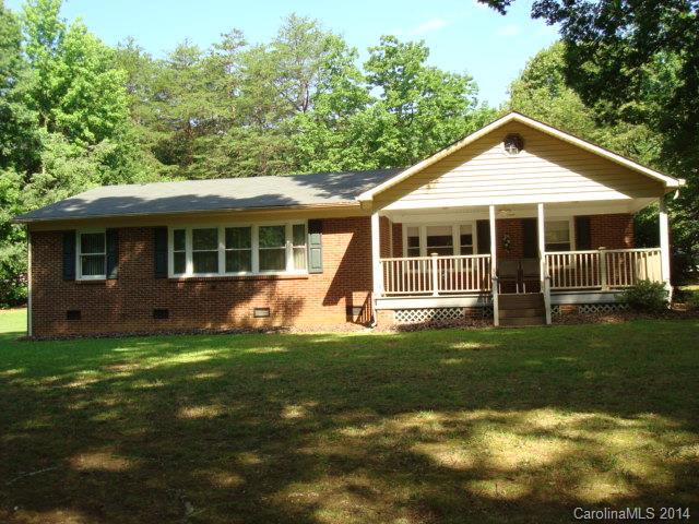 3205 Puetts Chapel Road Dallas, NC 28034 - Photo 24 of 24 a view of a house with a yard and sitting area