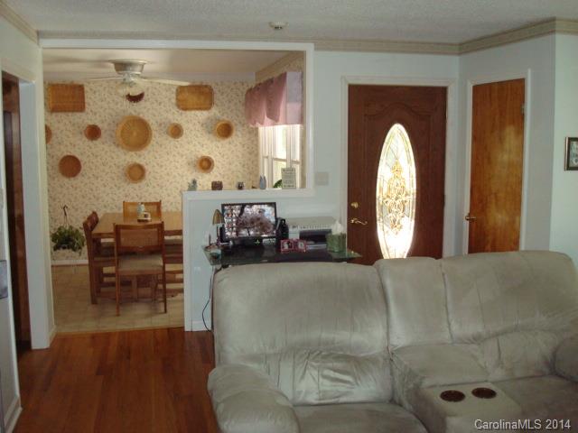 3205 Puetts Chapel Road Dallas, NC 28034 - Photo 7 of 24 a view of a livingroom with furniture and a window