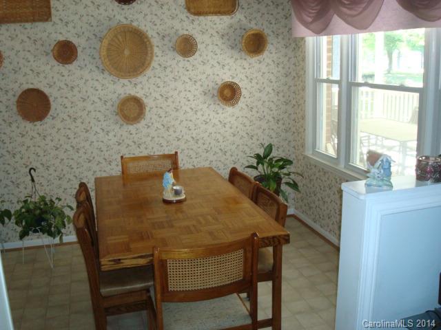 3205 Puetts Chapel Road Dallas, NC 28034 - Photo 8 of 24 a dining room with furniture and a window