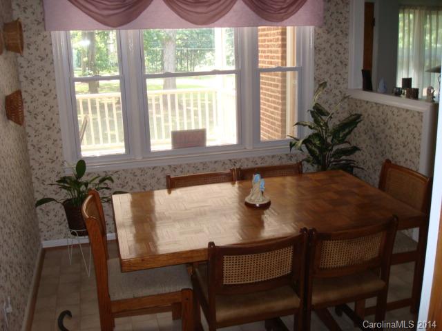 3205 Puetts Chapel Road Dallas, NC 28034 - Photo 9 of 24 a dining room with furniture and window