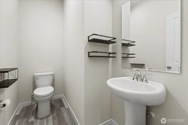 a bathroom with a sink and a toilet