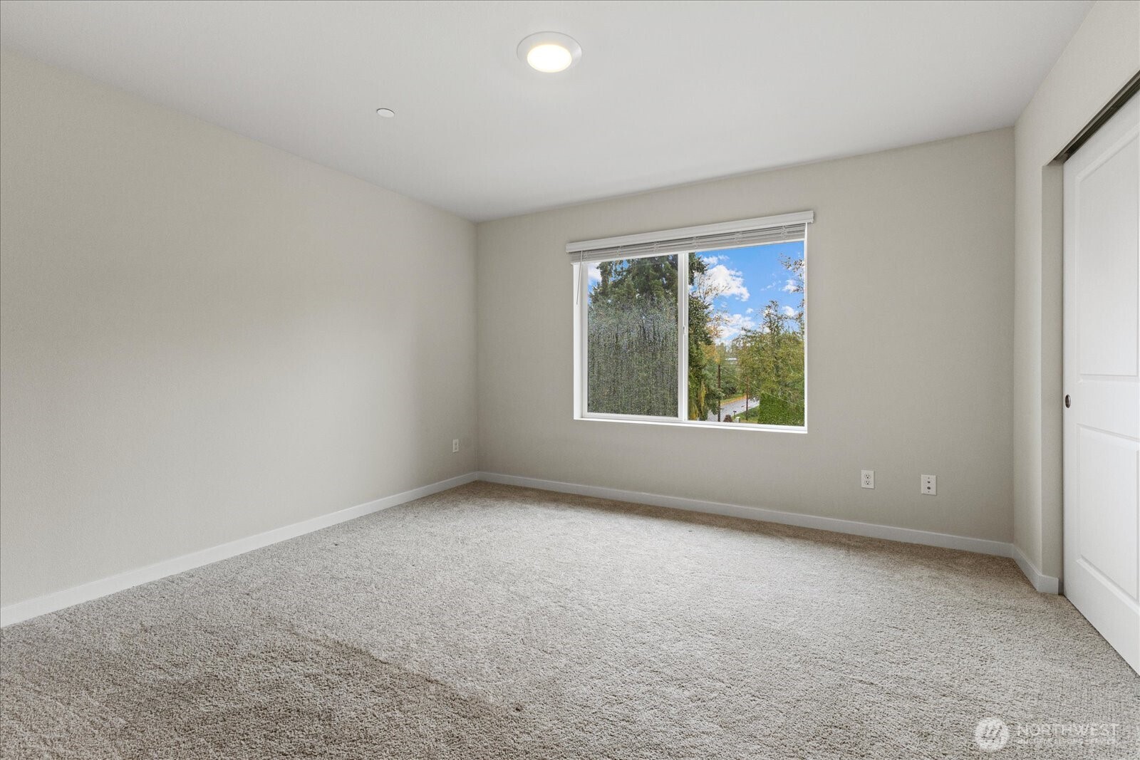 1831 100th Street Southwest, Unit B Everett, WA 98204 - Photo 17 of 27 an empty room with windows