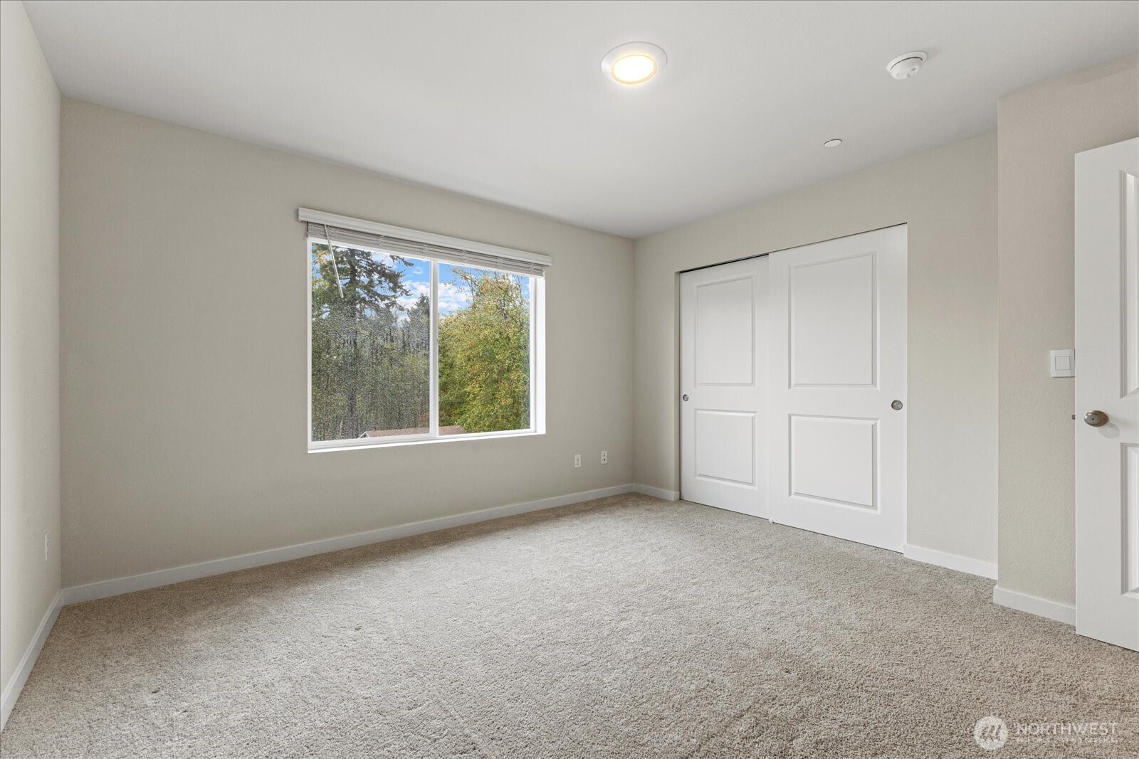 1831 100th Street Southwest, Unit B Everett, WA 98204 - Photo 20 of 27 an empty room with a window