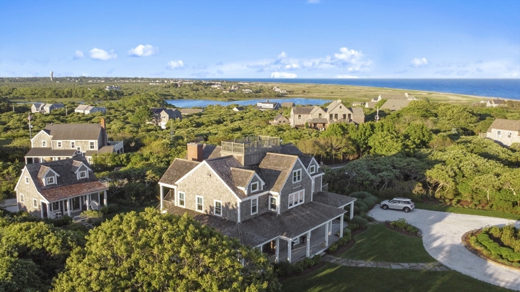 26 Old Tom Nevers Road, Unit 1 Nantucket, MA 02554 - Photo 1 of 31 an aerial view of multiple house