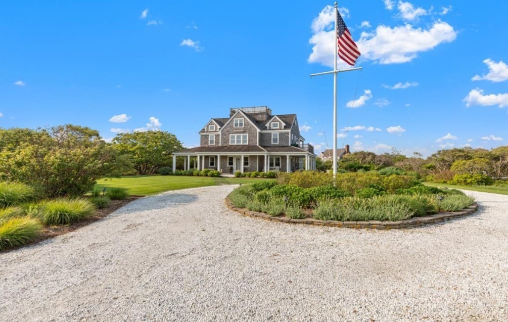 26 Old Tom Nevers Road, Unit 1 Nantucket, MA 02554 - Photo 22 of 31 a view of a house with a yard and garage