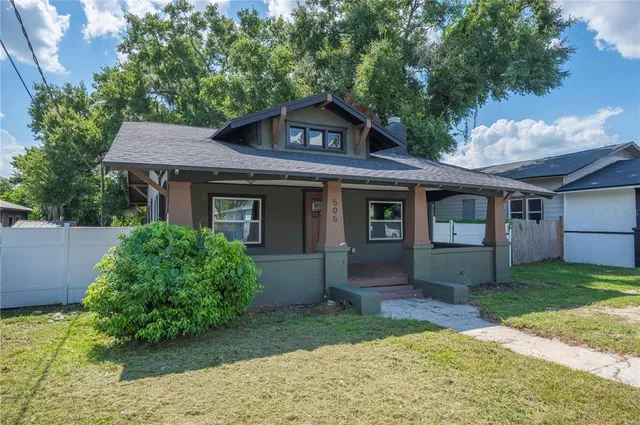 front view of a house with a yard