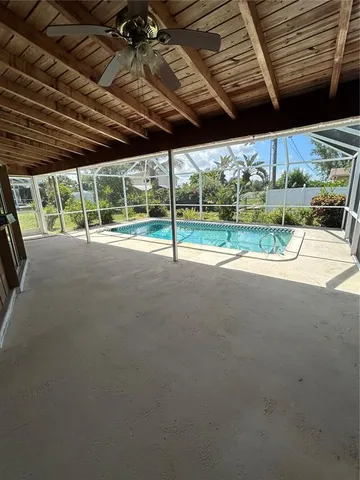 a view of pool with porch and outdoor space
